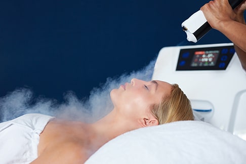 image of a woman getting a cryotherapy facial