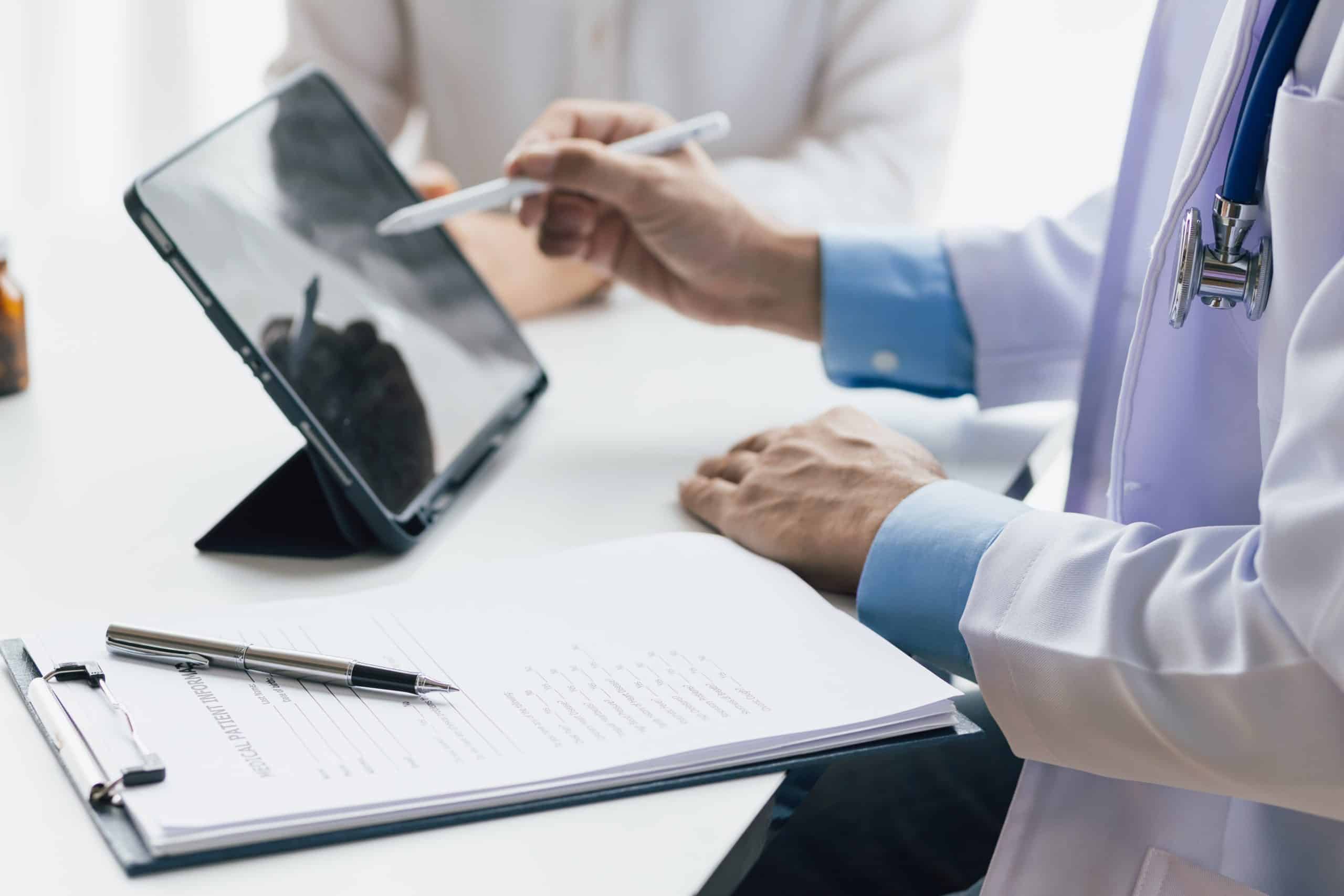 Dr. Scott™ discussing personalized metabolic wellness options with a patient